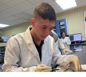 Student with Bunsen burner